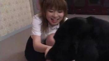 Smiling Asian chick really likes nasty beast sex with a dog