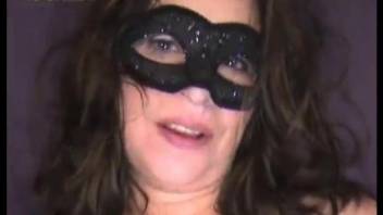 Sexy brunette in black mask is trying dog animal porn
