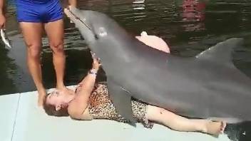 Sexy dolphin dry-humping a kinky redhead granny