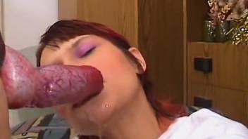Redheaded lady puts her lips to great use in a hot vid