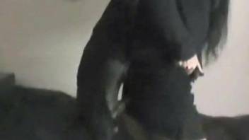Black dog fucking a submissive lady from behind