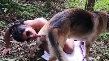 Inked lady fucked in the middle of nowhere by a dog