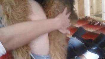 Ripped pants hottie getting fucked by a small dog